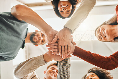 Buy stock photo Businesspeople hands stacked from below.Diverse businesspeople motivating each other. Architects united together. Businesspeople celebrate with hands stacked from below. Businesspeople in a circle