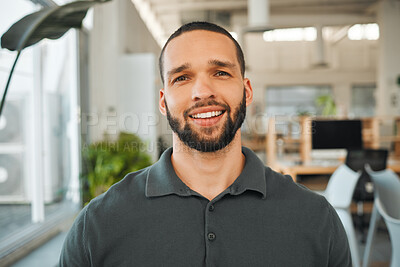 Buy stock photo Portrait of handsome young businessman in his office. Mixed race businessman standing in his office. Headshot of a young architect in his office. Corporate creative in his agency
