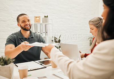 Buy stock photo Businesspeople collaborating. Businessman giving his colleague a contract. Smiling young businessman giving his coworker a report. Architects working together in their office