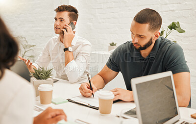 Businessman talking on a phone call. Young architect writing during a meeting. Businessmen in a meeting together. Engineers working together in a meeting. Businessman signing a contract