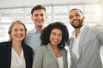 Portrait of a group of four cheerful diverse and positive businesspeople taking a selfie together at work. Happy mixed race businessman taking a photo with his joyful colleagues