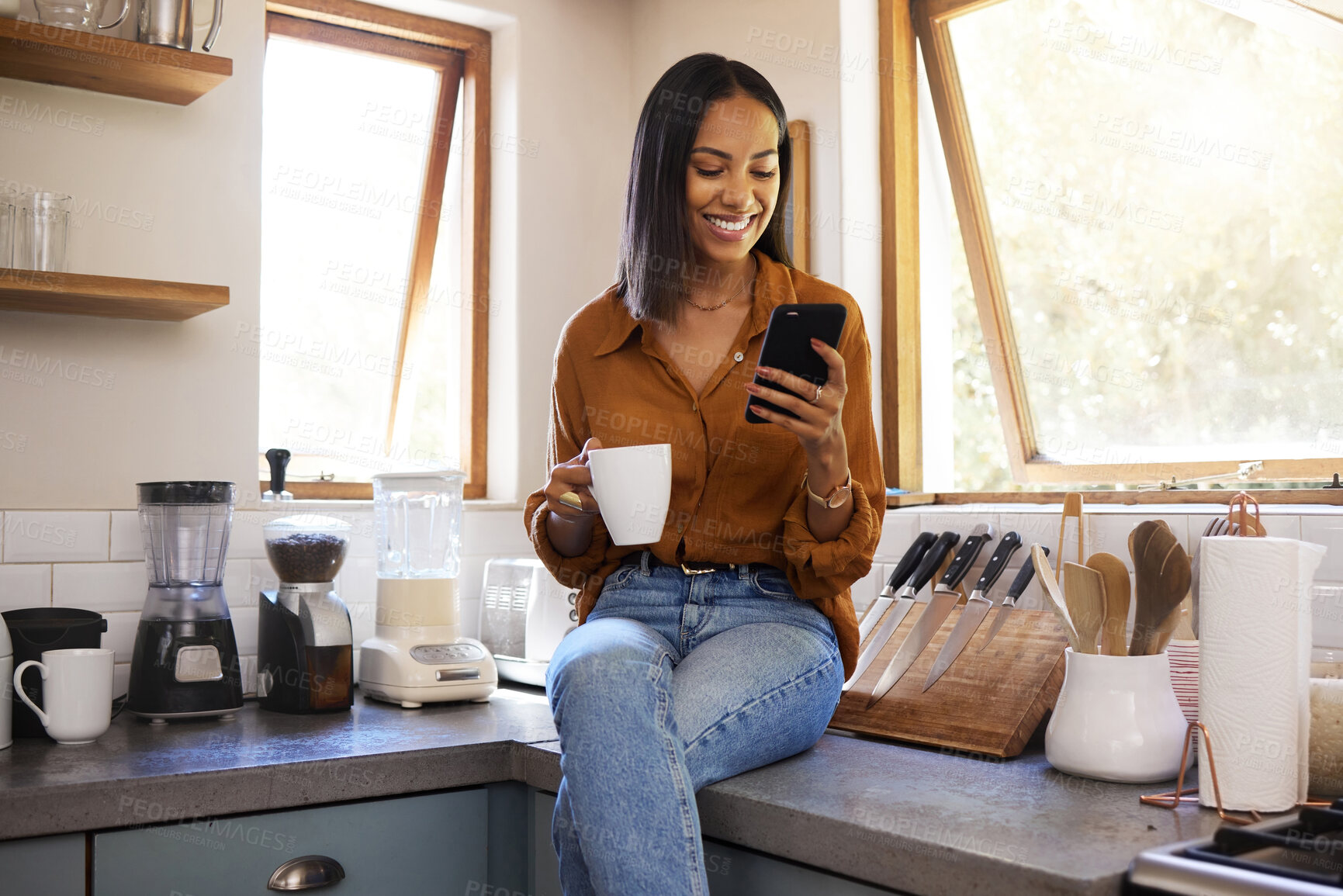 Buy stock photo Smile, kitchen and woman with phone on coffee break while browsing internet, checking social media meme or reading email. Chat, connect and work from home lifestyle, latino freelance in apartment.