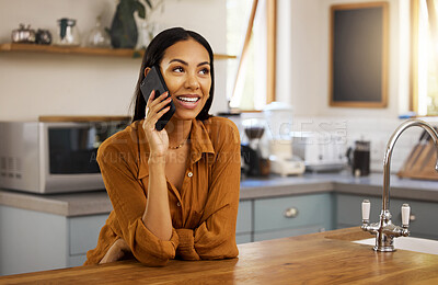 Buy stock photo Happy woman, phone call and kitchen in a home in a conversation. House, female and smile of a person with joy resting on a counter feeling relax and happiness on a mobile talking and communication
