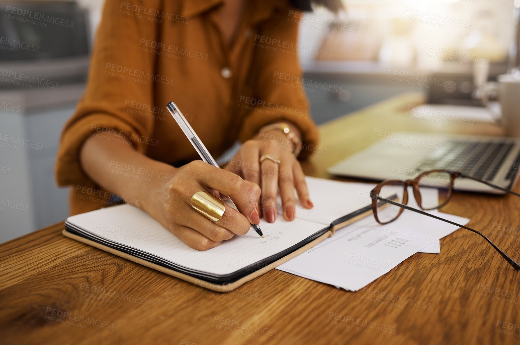 Buy stock photo Closeup, writing and woman on laptop with documents for budget, savings and paying bills in her home. Paper, financial and future planning, investment and growth by female checking finance notes