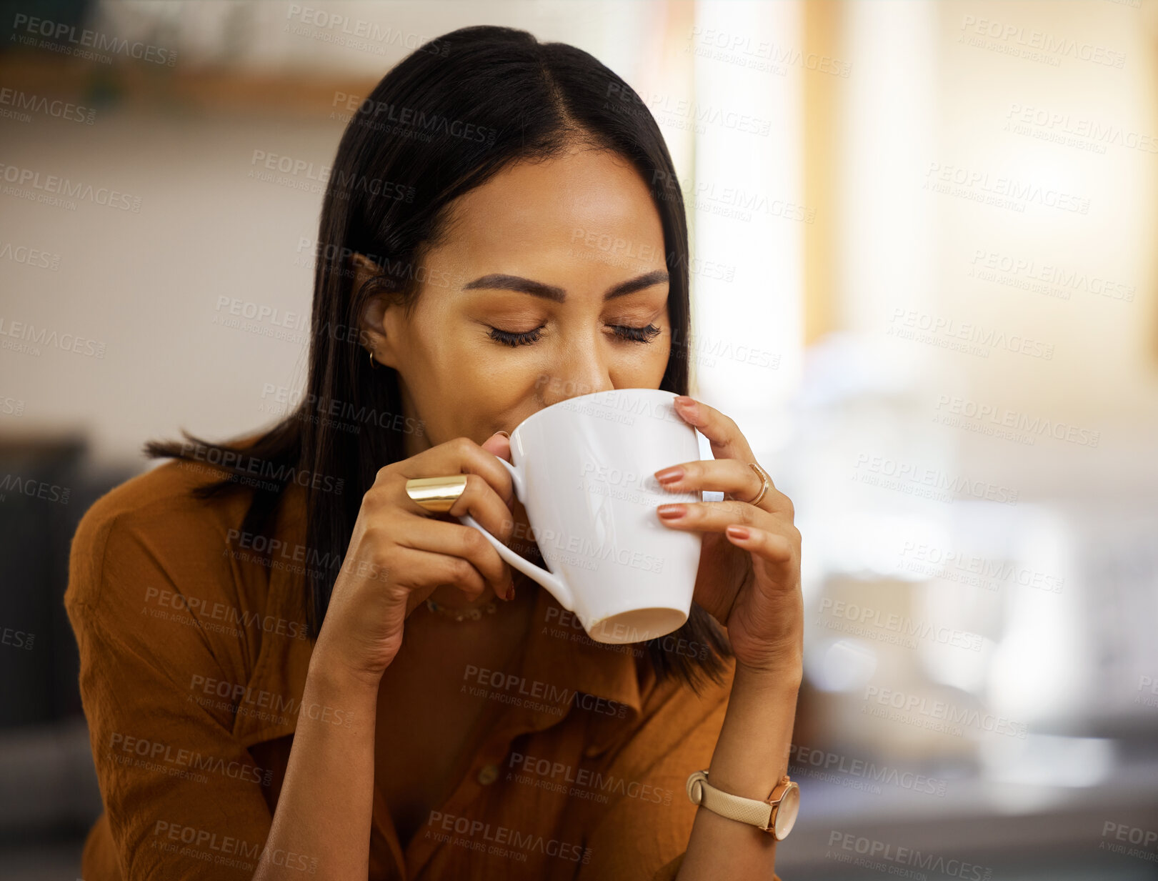 Buy stock photo Happy, coffee and woman at home in a kitchen with a hot drink feeling relax and calm in the morning. Happiness, zen and young female drinking in a house holding a mug in a household with mockup