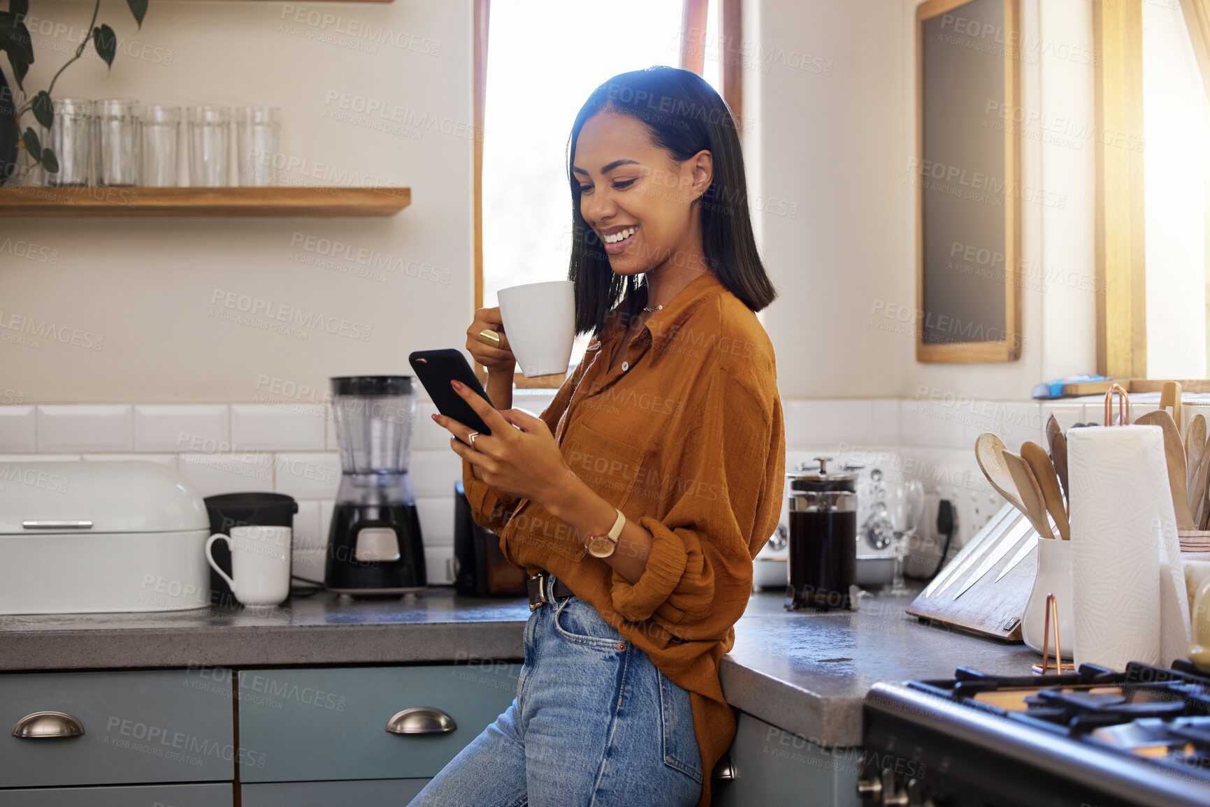 Buy stock photo Coffee break, phone and woman standing in kitchen while browsing internet, checking social media or reading email. Chat, connect and relax, resting and latino female in apartment on a break