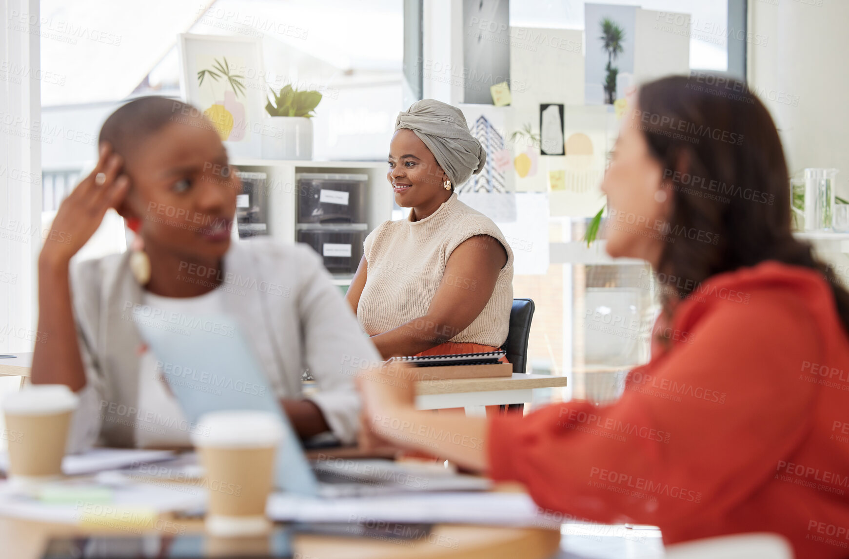 Buy stock photo Smile, ambition and an african american business woman sitting at work in an office. Confident, focus and a professional behind a team of colleagues, determined to be a success in the company