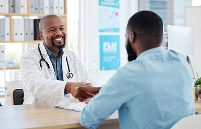 Buy stock photo Happy doctor, patient and handshake in healthcare for checkup, consultation or agreement at hospital. Black man, medical professional shaking hands with client for consulting, visit or appointment