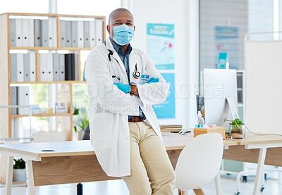 Buy stock photo Covid, portrait and a doctor black man in his office, standing arms crossed for healthcare or insurance. Medical, mask and trust with a male medicine professional at work in a wellness clinic