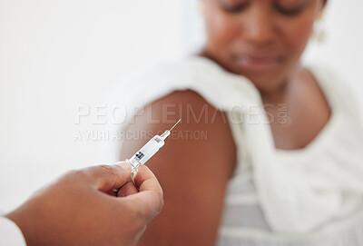 Buy stock photo Hand, covid vaccine and a patient with her doctor in the hospital for an injection of medicine or antibiotics. Healthcare, medical and a consulting with a male medicine professional holding a syringe