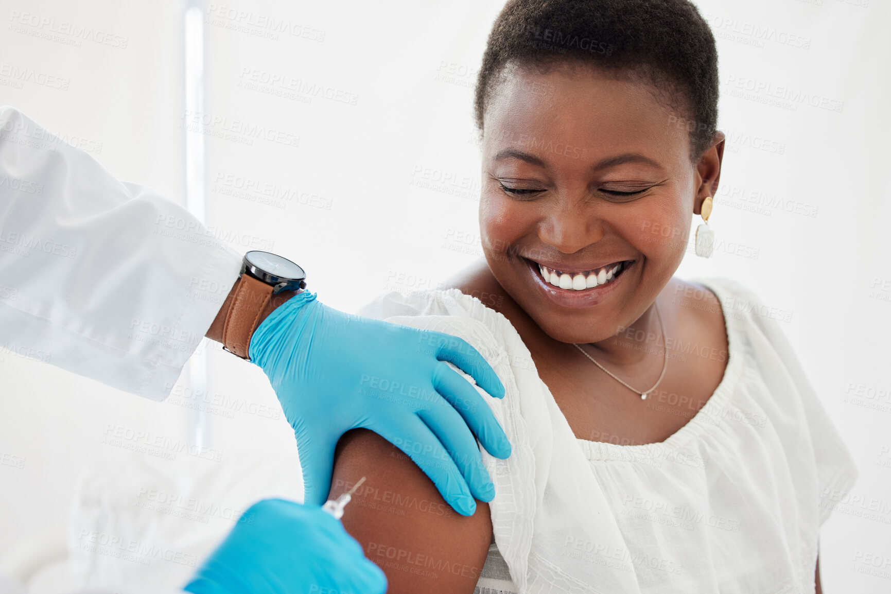 Buy stock photo Doctor, black woman and vaccine injection with smile for safety, immunity and prevention. Covid, healthcare and medical professional with vaccination, cure or medicine for happy patient in clinic.