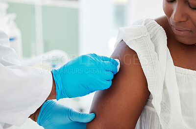 Buy stock photo Medical doctor cleaning an arm before an injection in a consultation room in the hospital. Professional, hygiene and hand of healthcare worker wipe the skin before a vaccine in a medicare clinic.