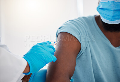Buy stock photo Hand, arm and covid vaccine with doctor and patient in hospital, safety from virus with needle and healthcare. People in medical consultation, immunization and black man in face mask and injection