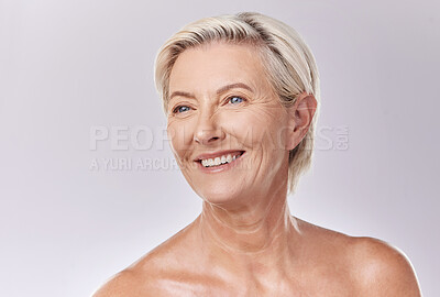 Buy stock photo Mature beauty and skin of woman posing in skincare and cosmetics with teeth and smile. Portrait of a happy senior model or elderly lady face in wellness with healthy skin care in a studio.