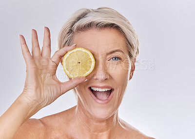 Buy stock photo Skincare, wellness and face of mature woman with wrinkles holding lemon with nutrition, vitamins and health. Portrait of happy senior lady with fruit and healthy, organic and fresh self care routine.