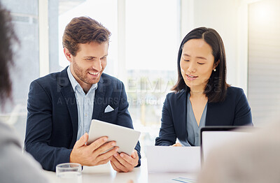 Buy stock photo Business people, meeting conversation and tablet ideas together in an office. Asian woman employee reading a report review with a businessman while talking and planning a company strategy with data