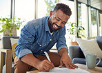 Happy bachelor signing a contract. Man filling out insurance documents. Handsome young man filling out banking papers. Hispanic young man filling out paperwork to invest insurance