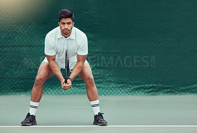 Buy stock photo Sports, space and man at court for tennis, training and mockup, mindset and focus on green background. Fitness, workout and Indian male player with racket for match, competition and body exercise