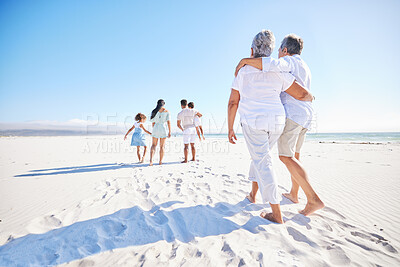 Buy stock photo Big family, sea or old couple walking with kids in summer with happiness, trust or peace in nature. Grandparents, back view or senior man bonding with woman or children taking a walk on beach sand