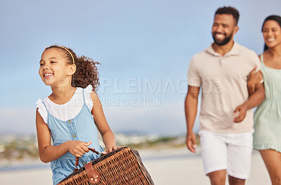 Buy stock photo Happy family, parents or kid walking for beach picnic to relax on fun summer holiday vacation together. Excited dad and mother or excited young girl bonding, smiling or holding basket at seashore 