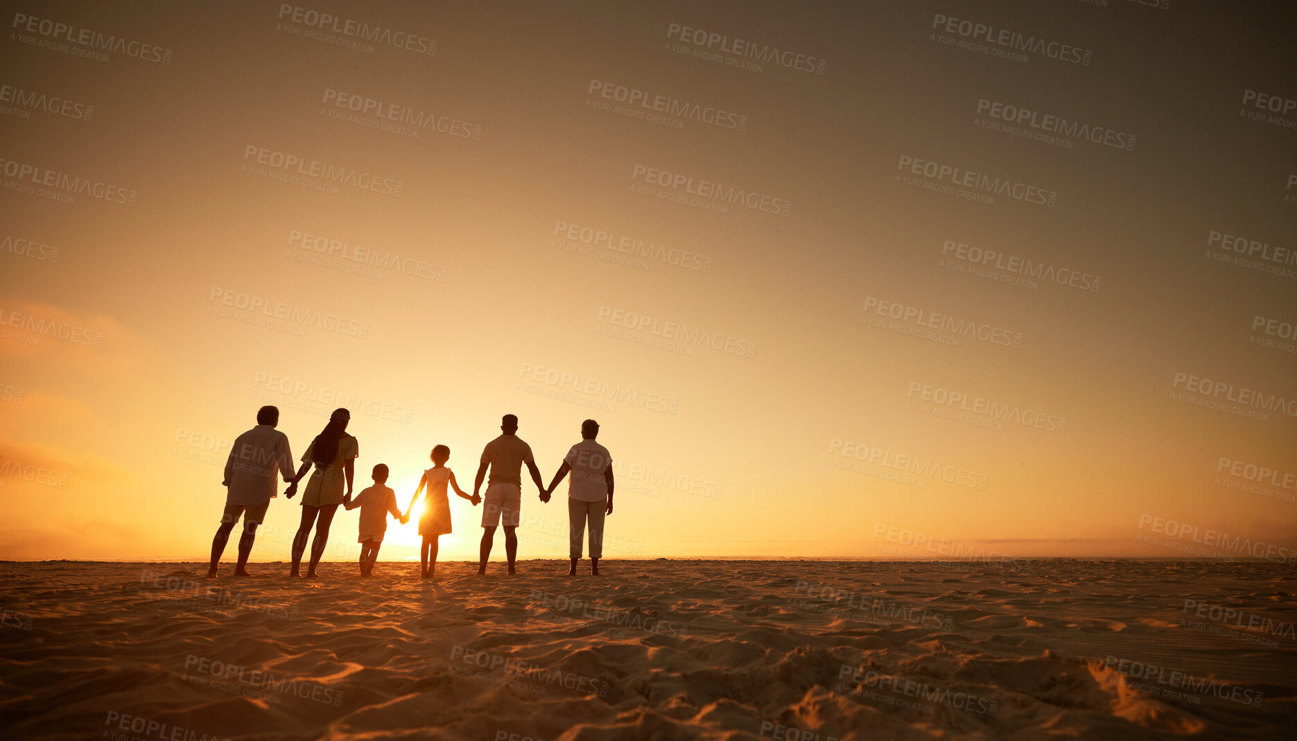 Buy stock photo Family, holding hands beach at sunset and generations, grandparents travel with parents and kids with orange sky. Back, unity and men, women and children, silhouette and vacation with mockup space