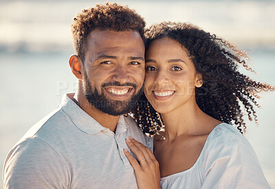 Buy stock photo Love, happy and portrait of couple at beach for summer holiday, vacation and romantic date. Travel, dating and mixed race man and woman enjoying sunset for bonding, relaxing and honeymoon by sea