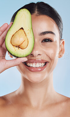 Buy stock photo Avocado, wellness and skincare woman portrait on blue studio background and mockup. Young model with natural organic nutrition diet for face and healthcare with green, clean and healthy lifestyle