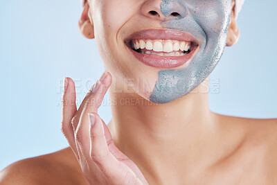 Buy stock photo Skincare, beauty and face mask with a beautiful woman taking care of her clean, healthy and glowing skin. Closeup smile, wellness and charcoal or clay exfoliate product during routine treatment
