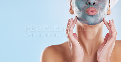 Buy stock photo Facial, beauty and skincare with woman and face mask for clear skin, acne or luxury cosmetics against a blue background. Wellness, spa and relax with female and salon face treatment product