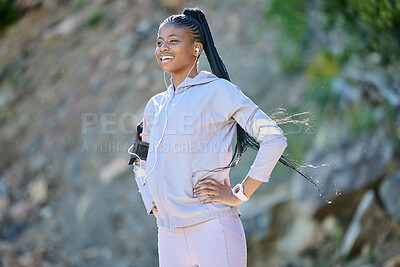 Buy stock photo Black woman hiking, fitness and earphones for music, motivation with podcast and enjoy view with smile outdoor. African female hiker, nature and mockup space with exercise and radio streaming