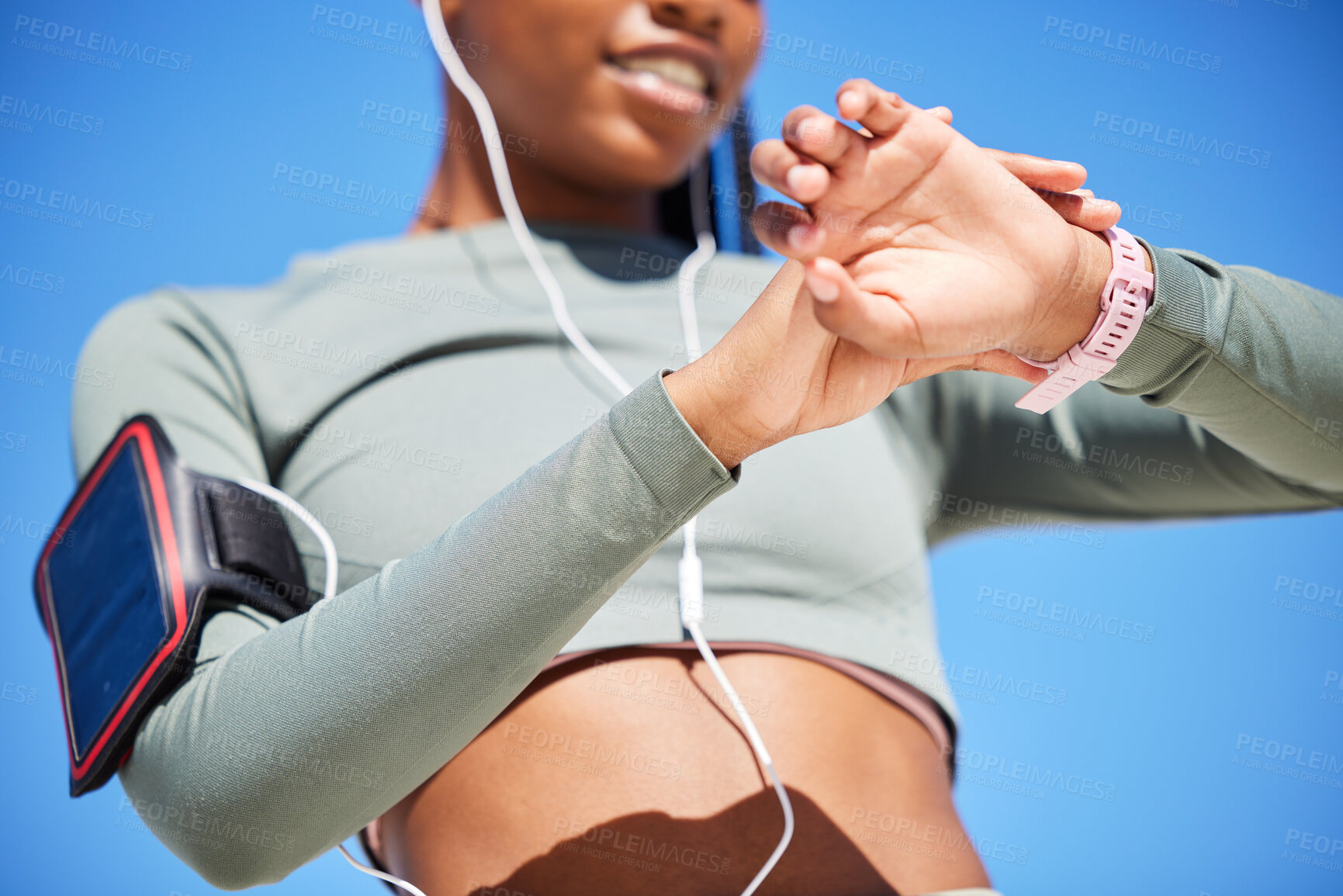 Buy stock photo Fitness, smart watch and black woman with progress, outdoor or checking time with workout goal, training or earphones. Female person, girl or athlete with tracker, activity or cellphone with practice