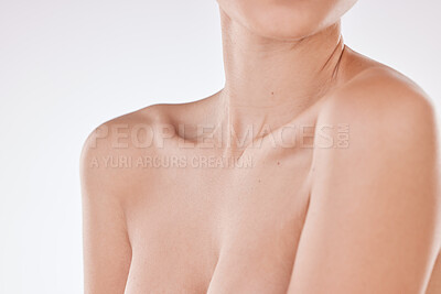Closeup of an unrecognizable young mixed race model enjoying a relaxing treatment after a shower while posing against a white copyspace background. Hispanic woman with radiant skin in a studio