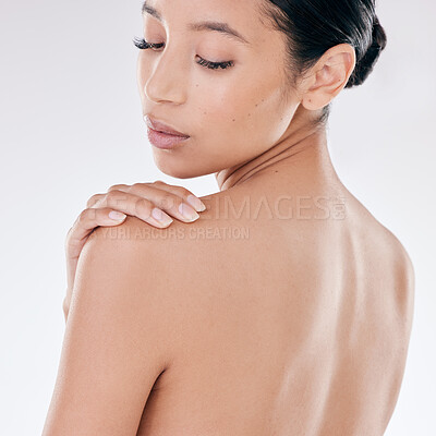 Buy stock photo Closeup of a beautiful young mixed race model enjoying a relaxing treatment after a shower while posing against a white copyspace background. Hispanic woman with radiant skin in a studio