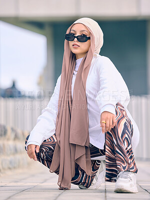 Buy stock photo Portrait, fashion or religion with a muslim woman in the uae wearing a hijab and scarf for contemporary style. Islam, faith and burka with a trendy young islam person outside in traditional clothes