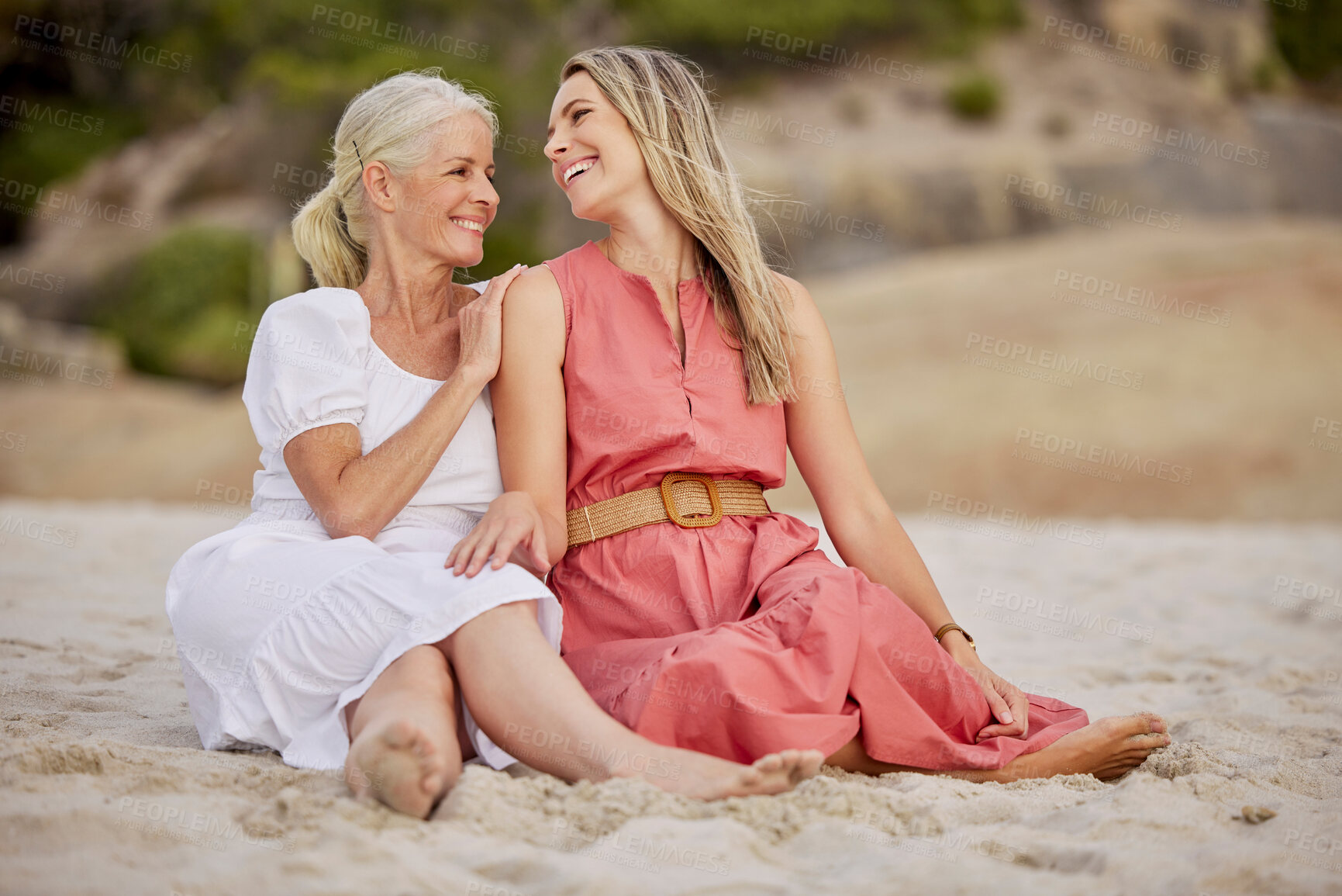 Buy stock photo Relax, beach and senior mom with daughter for bonding holiday, love and embrace on weekend travel. Nature, mother and woman laughing on ocean adventure together with smile, fun and island vacation.