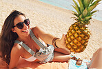 Beautiful happy Woman holding Exotic Pineapple fruit symbol of summer beach vacation healthy organic diet food