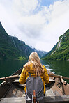 Adventure woman enjoying majestic river view from row boat epic landscape travel discover explore beautiful earth