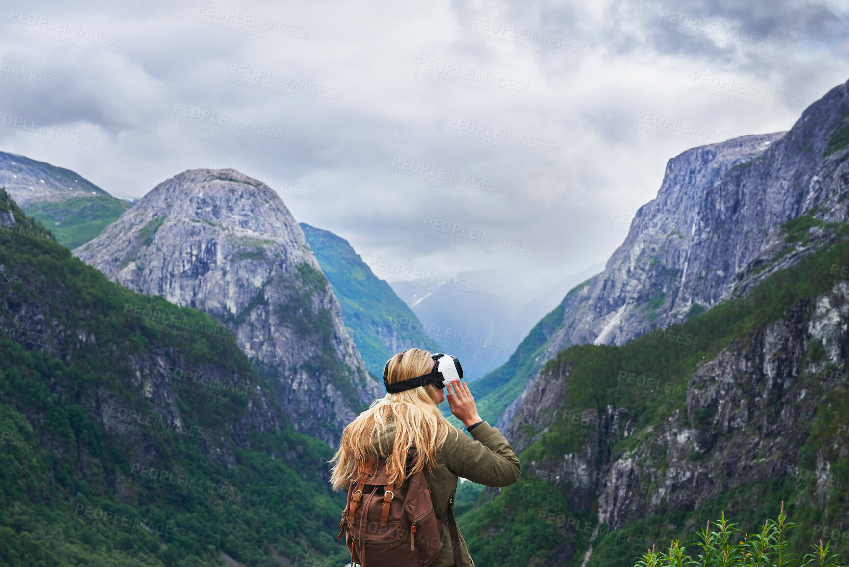 Buy stock photo Adventure woman wearing vr headset augmented virtual reality in beautiful mountain landscape concept