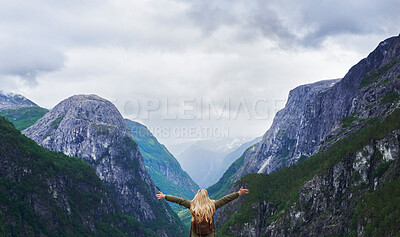 Buy stock photo Travel adventure woman celebrates arms raised  at view of majestic glacial valley on exploration discover beautiful earth