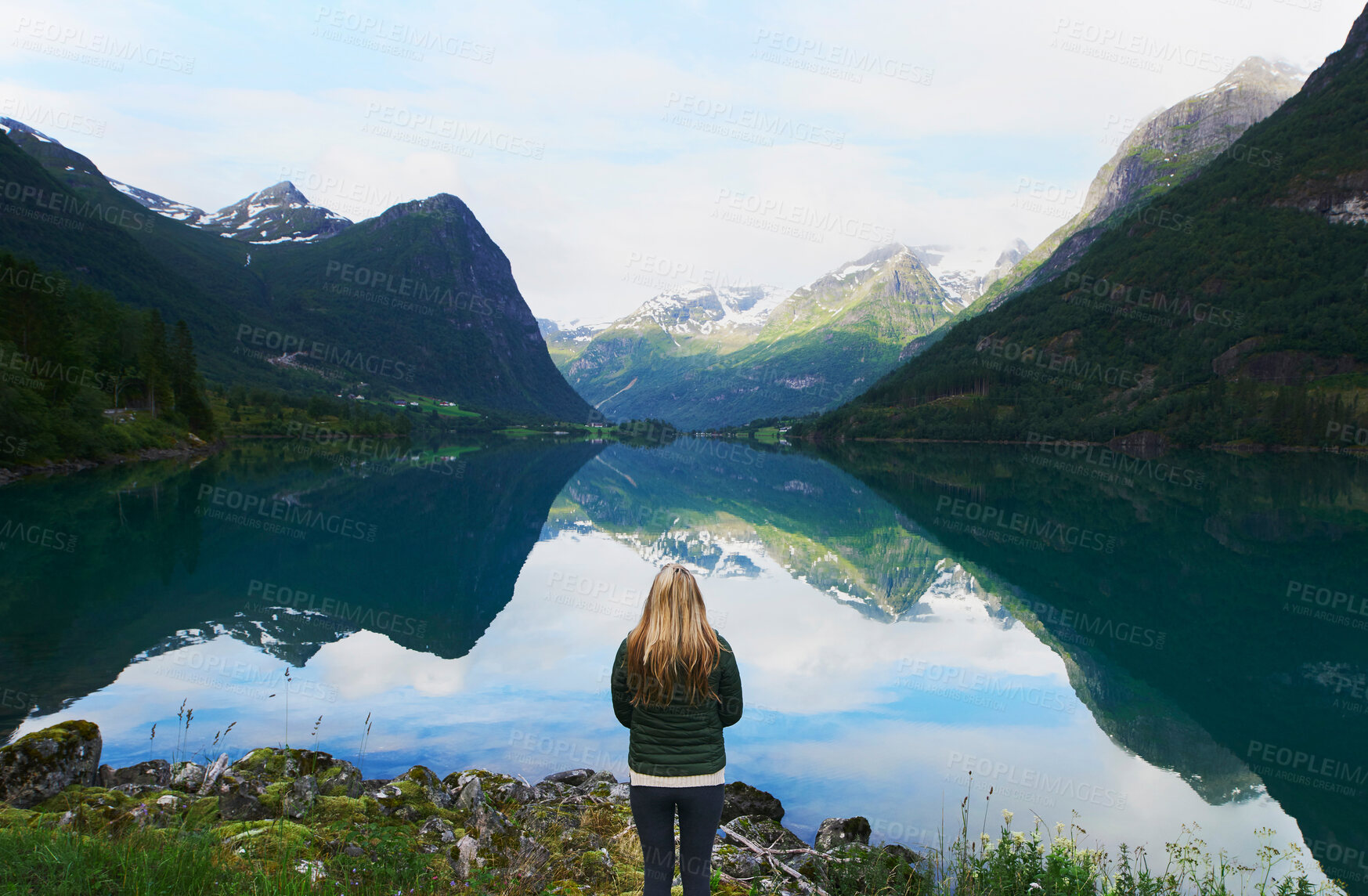 Buy stock photo Adventure woman enjoying view of majestic mountain lake explore travel discover beautiful earth