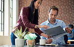 asian business woman sharing documents with businessman in office colleagues working together on project