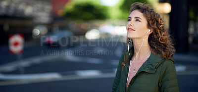 Buy stock photo beautiful woman walking in city street listening to music wearing earphones urban lifestyle