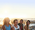 group of friends on beach enjoying summer holiday students having fun vacation hanging out on beachfront at sunset