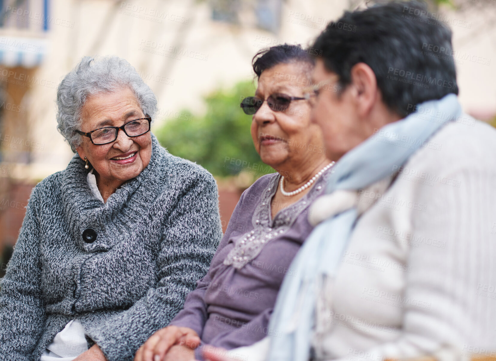 Buy stock photo Outdoor, conversation and bench with senior women, love and bonding together with retirement, park and cheerful. Old ladies, outside or mature people with discussion, group and joy with weekend break