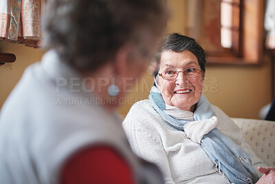 Buy stock photo Senior women, retirement home and friends with smile and conversation in a living room with talk. Elderly people, discussion and lounge with bonding, communication and happy chat together on a sofa