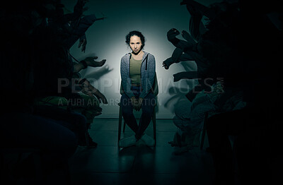Buy stock photo One mixed race female suffering mental illness in asylum. Hispanic schizophrenic  woman experiencing a breakdown while being surrounded by people on a stage theatre performance