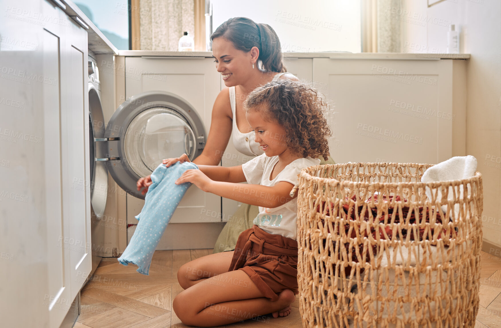 Buy stock photo Cleaning, help and washing machine with mother and daughter for laundry, learning and cleaner. Housekeeping, teamwork and basket with woman and young girl in family home for teaching and clothes