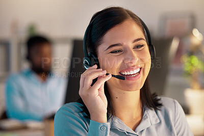 Buy stock photo Call center, smile and business woman in office for customer service, telemarketing or support at night. Contact us, crm and female sales agent, consultant or employee working on consulting deadline.