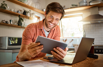 Buy stock photo Technology, happy man with tablet and laptop for remote work in kitchen of his home with a lens flare. Social networking or connectivity, online communication and male person smile for email