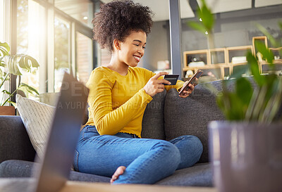 Buy stock photo Phone, credit card and woman on sofa online shopping, e commerce and fintech payment at home. Relax, loan and happy african person on internet banking, subscription and mobile app for web transaction